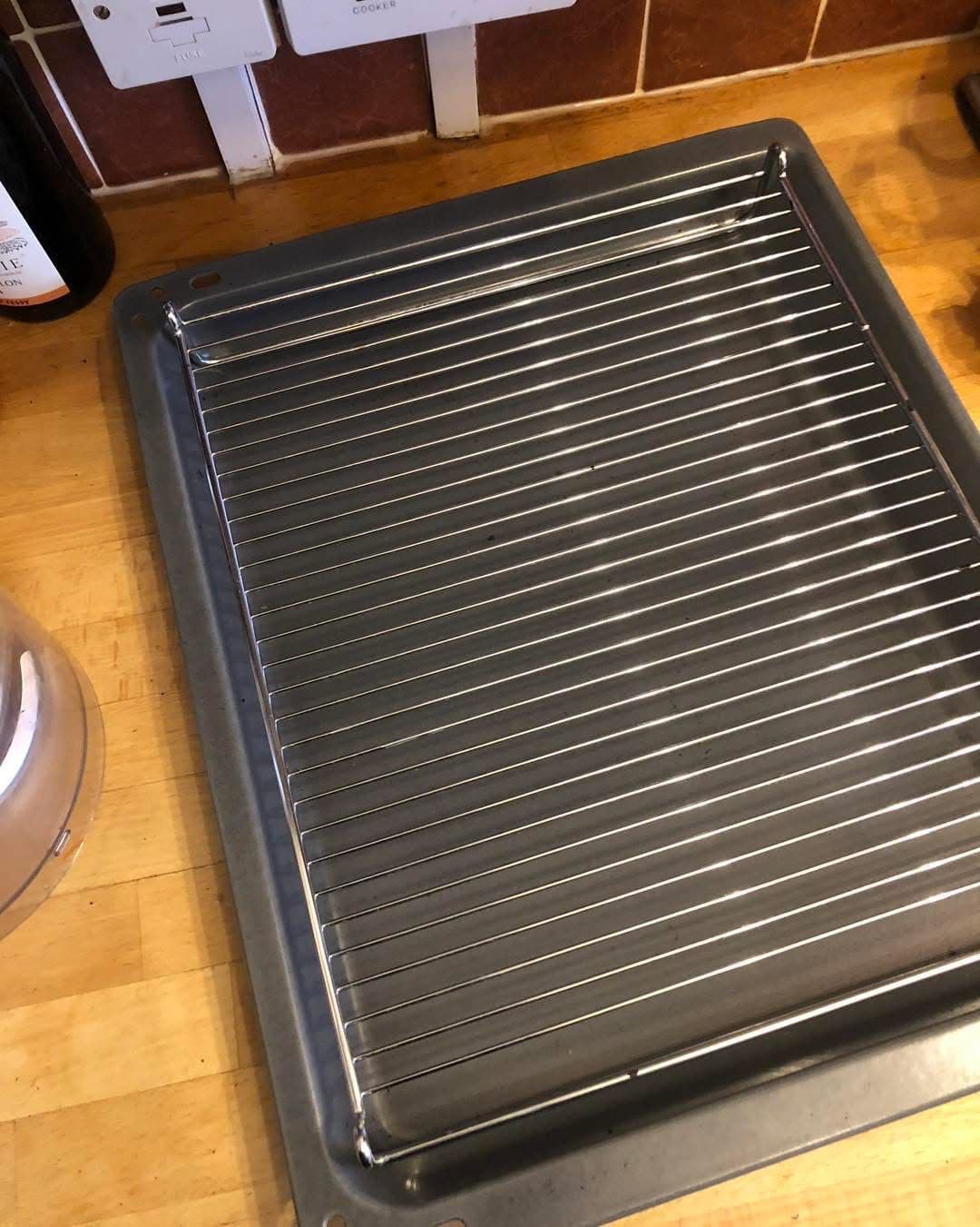 Spotless oven rack and tray after professional cleaning